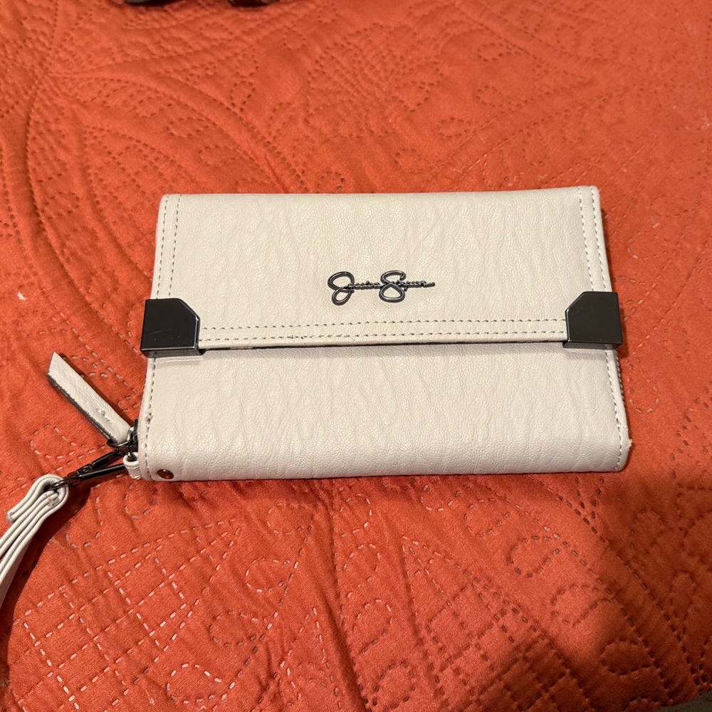 Jessica Simpson trifold wallet. Color is sort of a pale gray/beige.